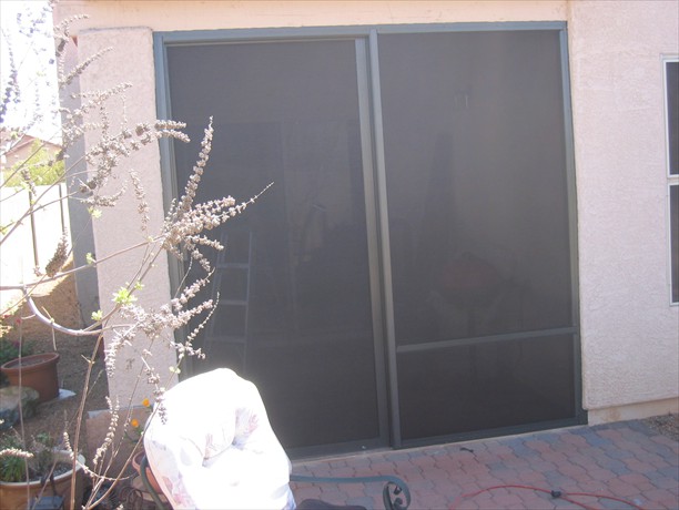 Sliding screen door and fixed panel