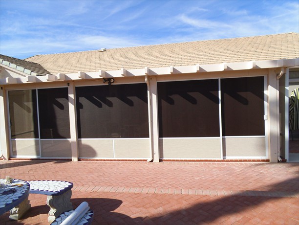 White frame with Brown and Stucco Sunscreen